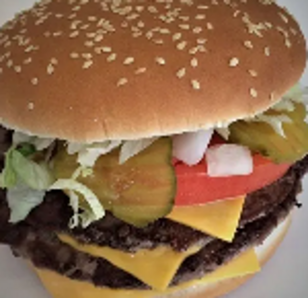 2-quarter pound beef patties & 3 slices cheese topped with mayo, ketchup, onions, pickles, tomato, & lettuce

$8.99 / Combo Price $13.33