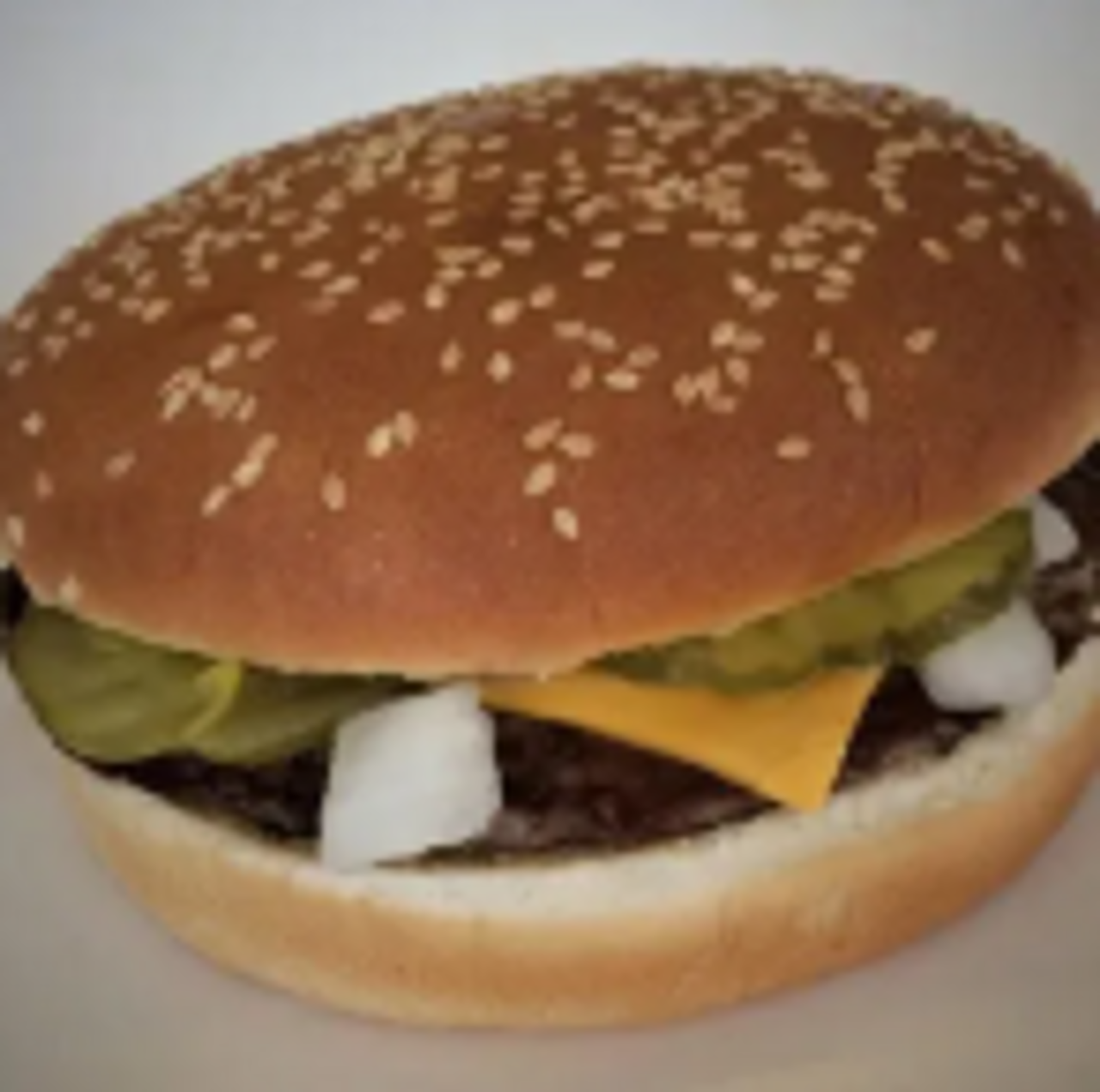 Two beef patties topped with ketchup, mustard, onions, pickles, & two slices of cheese

$6.09 / Combo Price $10.43