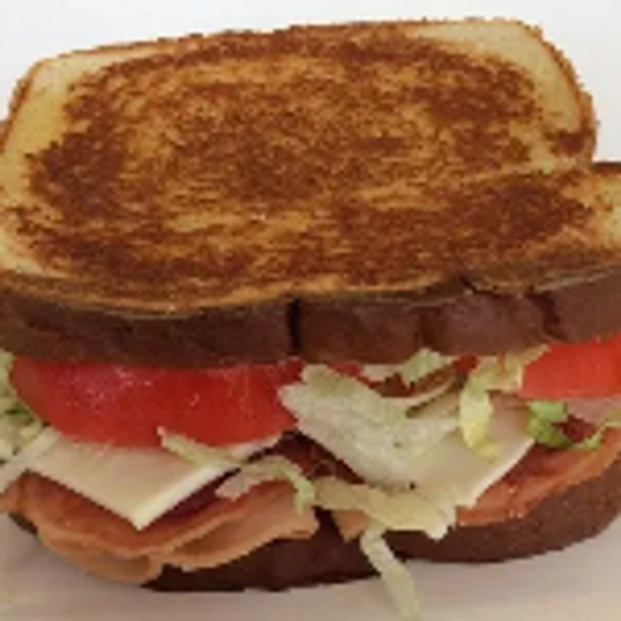 Sliced turkey, bacon, Swiss cheese, lettuce, tomato, & mayo. Served on grilled sourdough

$7.79 / Combo Price $12.13