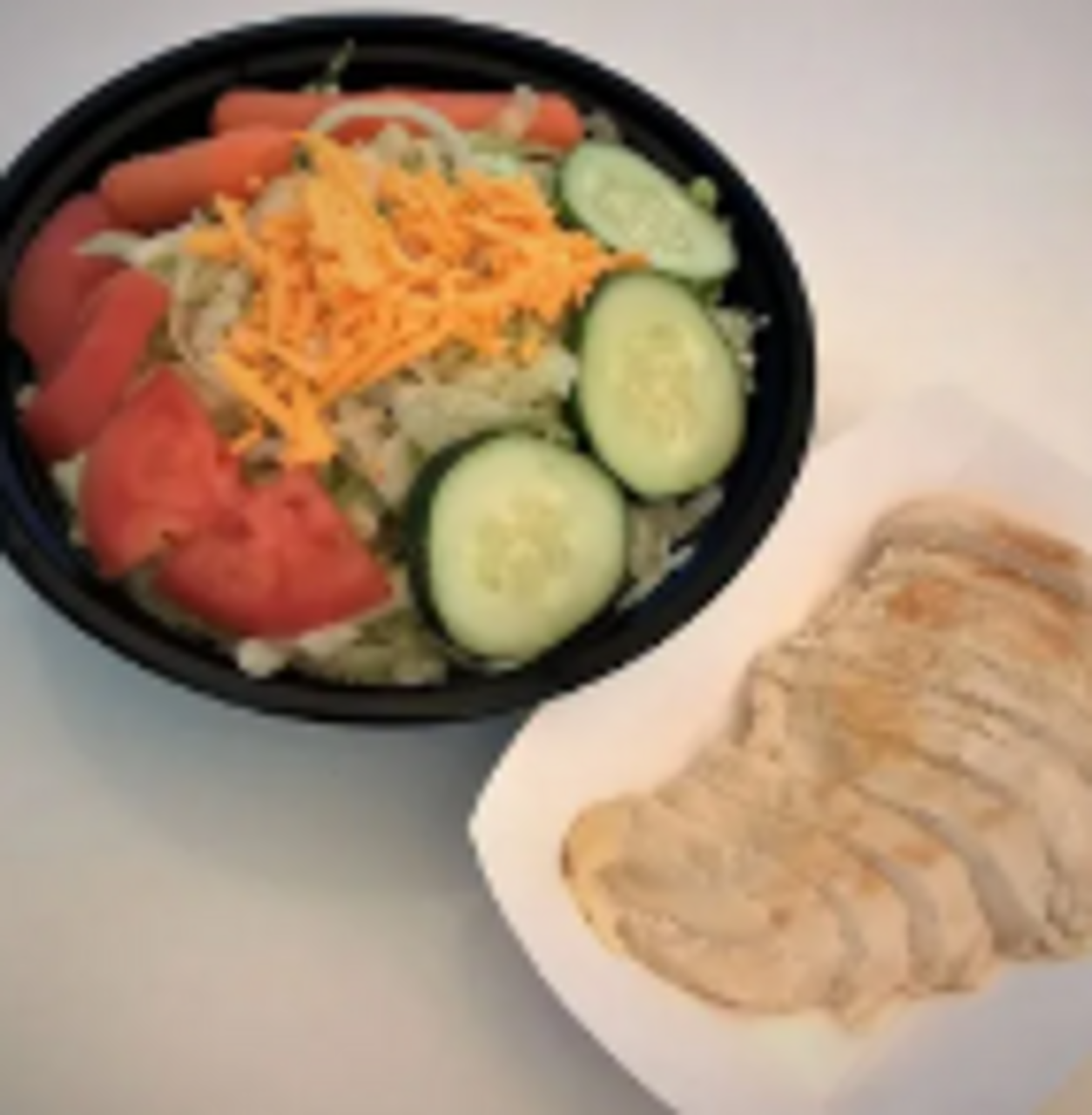 Served with your choice of sliced grilled or breaded chicken